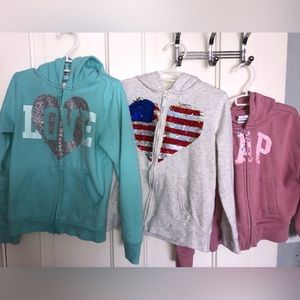 Girls zip up sweaters size 6/7